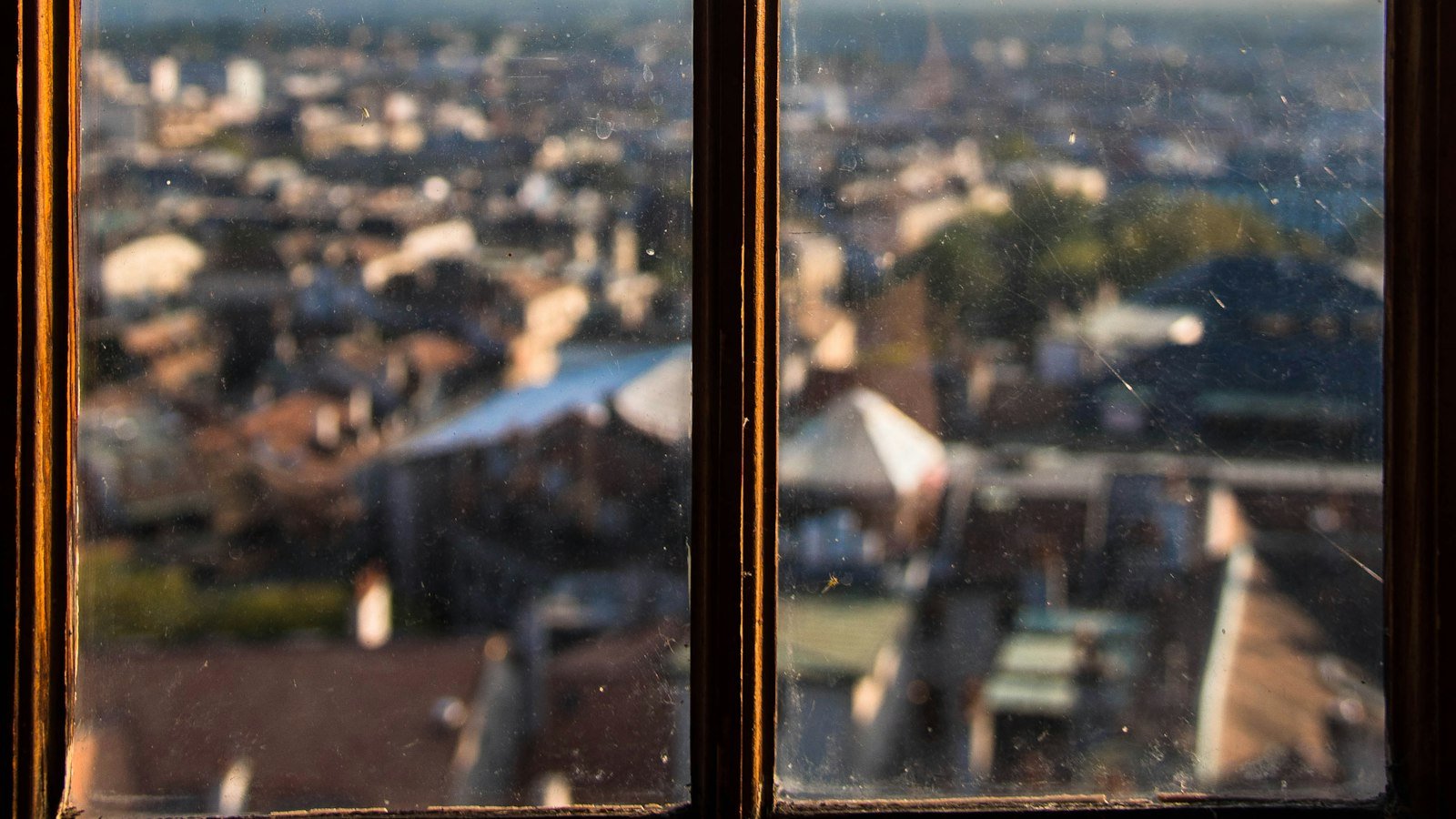 A city view through an apartment window, the outlook for a professional starting a business at 50
